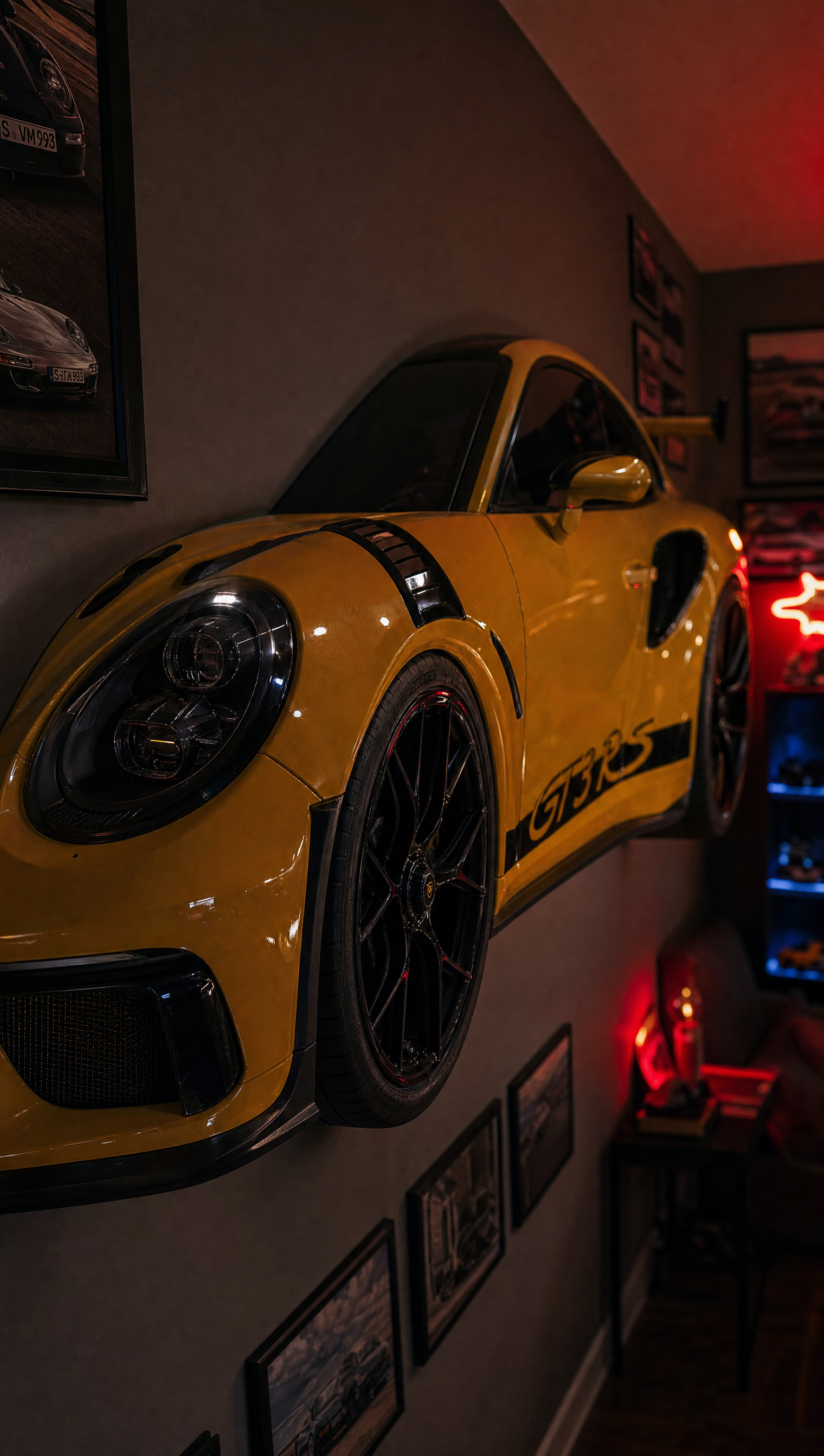 Racing Yellow GT3 RS wall mount, front three-quarter view